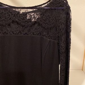 Lined black dress with lace bodice and sleeves